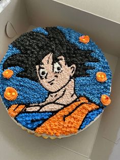 a birthday cake with an image of gohan on it