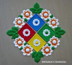 a colorful patchwork design with flowers and leaves