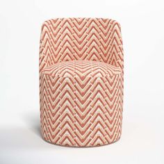 an orange and white chair on a white background