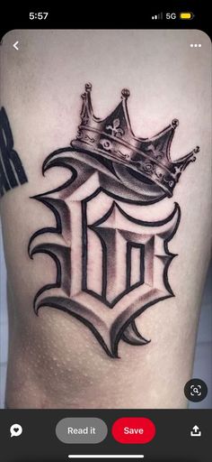 a man with a crown tattoo on his back