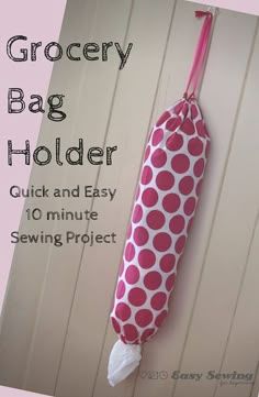 a pink and white polka dot bag hanging on a wall with the text grocery bag holder quick and easy 10 minute sewing project