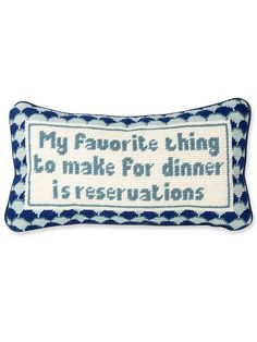 a blue and white pillow that says, my favorite thing to make for dinner is reservations