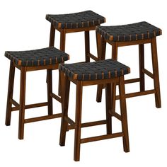 three wooden stools with black leather seats