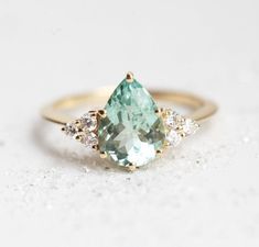 Best seller at Capucinne - Jeanie Pear Mint Tourmaline Ring Sapphire ring is listed here https://www.etsy.com/listing/691876141/light-jeans-blue-sapphire-ring-pear ga_search_query=jeans&ref=shop_items_search_2&frs=1 Details Main stone Green Engagement Rings, Engagement Ring Pear, Tourmaline Engagement Ring, Green Tourmaline Ring, Future Engagement Rings, Pear Engagement Ring, Green Diamond, Tourmaline Ring, Blue Sapphire Rings