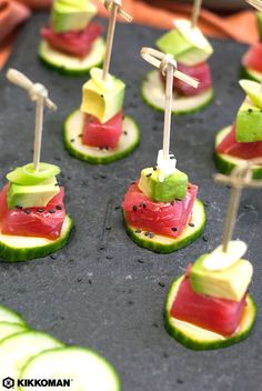 watermelon and avocado skewers with toothpicks on them