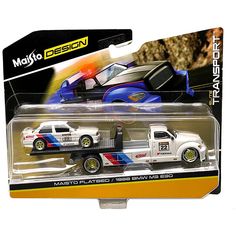 a white truck with blue and red stripes on it's back end is in the packaging