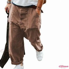 Qteee - Loose Fit Trousers: Casual and Stylish Work Pants - Straight Cut Casual Brown Tapered Leg Jeans, Casual Baggy Brown Cargo Pants, Baggy Brown Harem Pants With Pockets, Baggy Brown Cargo Pants For Spring, Casual Brown Baggy Harem Pants, Spring Baggy Brown Cargo Pants, Casual Brown Pants With Pockets, Casual Brown Pants With Side Pockets, Casual Brown Jeans With Side Pockets