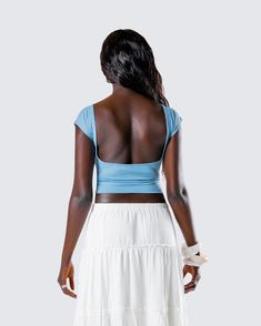 Sleek in the front, sexy in the back 💙 Made from jersey fabric, complete with a cap sleeve, regular length, low open back, and form-fitting style - this blue backless top is perfect for casual days, nights out, and everything in between 😍 Fitted Crop Top With Built-in Bra And Scoop Back, Solid Top With Built-in Bra And Scoop Back, Summer Night Out Tops With Ruched Back, Backless Fitted Top For Night Out, Casual Seamless Backless Top, Blue Fitted Backless Crop Top, Summer Backless Elastane Tops, Fitted Blue Backless Crop Top, Beach Tops With Built-in Bra