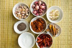 bowls filled with different types of food on top of a table