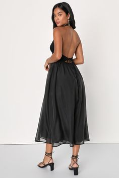 You're sure to be a stylish spectacle at your next big event when you arrive wearing the Lulus Delightful Drama Black Textured Halter Backless Midi Dress! Textured knit fabric shapes a trendy halter neckline (with button-loop closures at back) that flows into a lightly gathered triangle bodice with a slender tying strap that secures atop a flirty open-back design. An overlapping, banded waist, adorned with intricate seam detailing, tops a flowy organza skirt that boasts a skater-style silhouette Black Organza Dress, Backless Midi Dress, Organza Skirt, Lulu Fashion, Organza Dress, Halter Midi Dress, Dress Halter, Skater Style, Black Textures