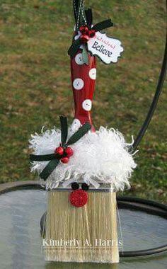 a christmas decoration on top of a table in the middle of a yard with green grass