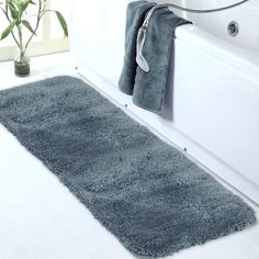 a bathroom rug with various colors and sizes