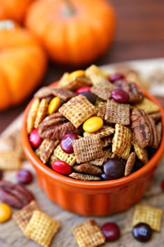 a bowl filled with candy corn snack mix