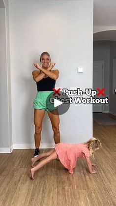 a man and woman doing push up exercises in an empty room with hard wood flooring