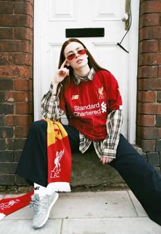 New Balance Present Liverpool FC 2019/20 Lookbook - SoccerBible Retro Soccer Fashion Ideas, Collegiate Style Red T-shirt For Streetwear, Retro Soccer Fashion, Retro Soccer Jersey Fashion Inspiration, Liverpool Blokecore, Hailey Bieber Rugby Shirt, Liverpool Outfit Women, Red Football Jersey Outfit, Liverpool Fan Outfit Ideas