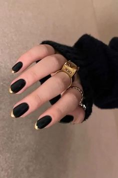 Are you looking for colored French tip nails to put a modern twist on a classic manicure? If so, you’ll love these 40 unique designs for your next nail set! For example, we love these black nails with gold tips – so chic! Black Nail With Gold Tip, Witchy French Nails, Black Nail Gold Tip, Black With Gold Tips Nails, Gold Black Nails Design, Black And Bronze Nails, Black Nail French Tip, Black Nails Gold Tips, Simple Black And Gold Nails