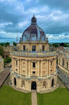 an aerial view of a large building with a dome