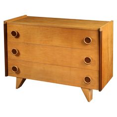 a wooden dresser with three drawers and four knobs