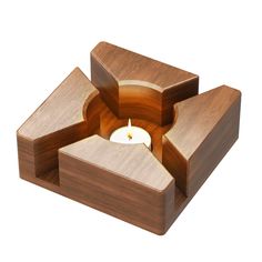 a wooden candle holder with three pieces of wood in the middle