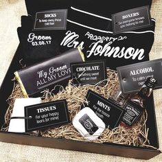 an assortment of personalized items in a gift box with labels on the front and back