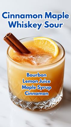 the bourbon lemon juice maple syrup cinnamon whiskey sourr is shown in front of a white marble countertop