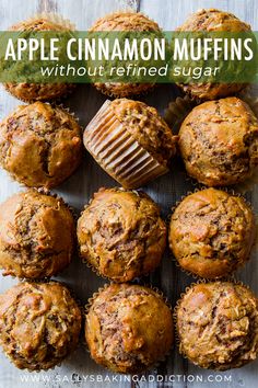 a bunch of muffins sitting on top of a wooden table