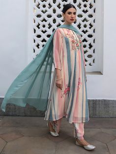 Elevate your ethnic wardrobe with our exquisite collection of Pakistani straight kurtis paired stylish pants. Perfect for any occasion, these outfits seamlessly blend traditional designs contemporary elegance. Made from high-quality fabrics, feature intricate embroidery, elegant prints, and a flattering cut that exudes sophistication Impress Everyone With Your Stunning Look By Wearing this gorgeous Ethnic Set. The Trendy Work & Designs Speak A Language Of Elegance And Felinity, Using The Finest Quality Fabrics And Is Trendy Fashionable As Well As Comfortable. It Is Light In Weight And Will Be Soft For Your Skin. A Pretty Kurta To Wear At Parties, Functions Or Just Casually Which Is Stylish & comfortable To Wear For Women Or This Kurti And You Will Be A Fashion Statement Every Time A Line Kurta, Gathered Dress, Keyhole Neckline