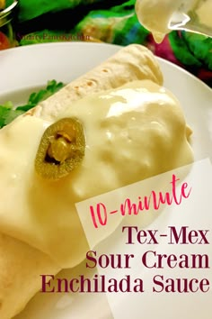 a close up of a plate of food with text overlay that reads 10 minute tex - mex sour cream enchilada sauce