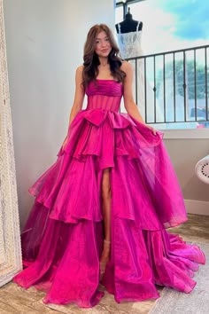 Any needs,Please contact us: vickidress@outlook.com ● Standard Delivery Time: 15-20 days● Expedited Delivery Time: 10-15 days Silhouette: A-Line Material: Organza Neckline: Strapless Details: Ruffle Tiered, Slit Length: Long This stunning A-line prom dress features a strapless neckline and is crafted from airy organza. The ruffle-tiered design adds volume and movement, while the elegant slit enhances its sophisticated appeal. Perfect for prom or any formal event where you want to exude timeless Different Prom Dresses Unique, Prom Dresses Hot Pink, Birthday Gown, Lavender Prom Dresses, Prom Dress Trends, Ruffle Prom Dress, Black Homecoming Dress, White Homecoming Dresses