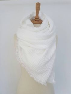 Pure Cotton Scarf in Snow White Scarf is made from naturally wrinkled  100% cotton gauze ( double layer ) ultra soft fabric and is perfect for spring, summer, autumn and light winter days. Ultra Soft Comfy scarf will keep you really Cozy !    Perfect Bridesmaid Gift Size:  ~50x220 cm / 20x87 inches ~70x220 cm / 28x87 inches ~80x220 cm / 31x87 inches ( size on photo ) Material:  - 100 % Cotton Gauze / Double Layer  Color:  - snow white Scarf is finished with fringes . Care: machine washable and d Scarf Blanket, White Scarf, White Woman, White Scarves, Oversized Scarf, Gauze Fabric, Cotton Scarf, Blanket Scarf, Beautiful Fabric