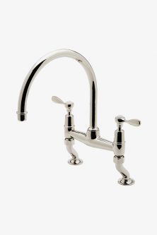 a kitchen faucet with two handles and nozzles on the side, against a white background