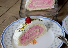 a piece of cake on a plate with a fork next to it and another slice in the background