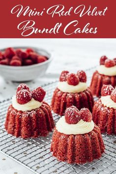 mini red velvet bundt cakes on a cooling rack with strawberries in the background