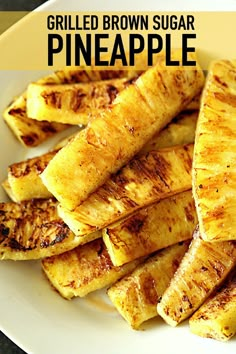 a white plate topped with sliced bananas on top of a table