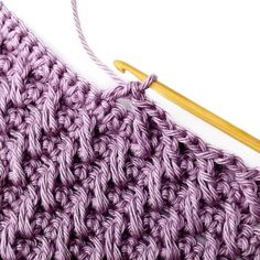 the crochet stitch is being worked on