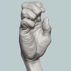 an image of a hand that is holding something in it's right hand, with the thumb raised up