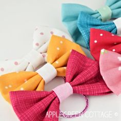 three bow ties with polka dots on them