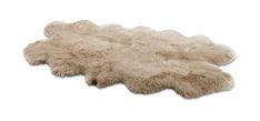 a sheepskin rug is laying on top of the white floor and it looks like an animal's fur