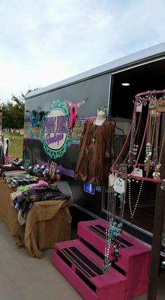 the back of a truck with jewelry on display