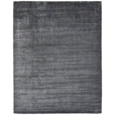 a gray rug on a white background with no one in the room to see it