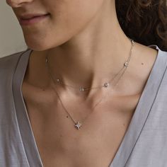 This necklace features a dainty starburst pendant on a delicate, diamond-cut cable chain from our signature O Collection. Pair it with other necklaces from this collection. Our patented connectors let you easily link and layer necklaces in any order you desire. Pendant: Height 11mm x Width 11mm Adjustable chain: 15-17in (38-43cm) When layered, chain length is: 15-21in (38-53cm) Learn more .925 Sterling Silver Cubic Zirconia Hypoallergenic, lead and nickel free #379S Layer Necklaces, Starburst Pendant, Starburst Necklace, Minimal Gold, Silver Necklace Set, Layered Chain, Necklace Sets, Delicate Chain, Multi Strand Necklace