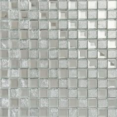 a close up view of a glass tile wall