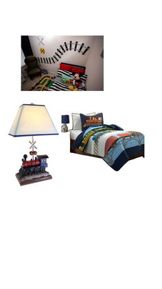 a bed room with a train themed comforter and two lamps