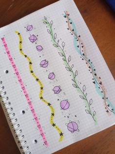 an open notebook with different designs on it