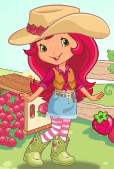 a girl in a straw hat holding a beehive next to some strawberries