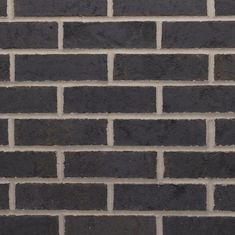 a black brick wall is shown with no mortars or mortars on the side