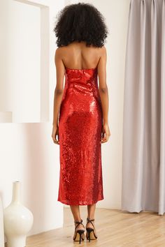 Get ready to shine this season with the stunning Ariana Sequins dress. This strapless dress is the perfect combination of sophistication and comfort. LENGTH: 44" from center back FABRIC: 100% POLYESTER STYLE#: DR-21157 in RED SEQUINS - REDSQ *Dry Clean Only*Model is wearing a size XS Ariana Dress, Wedding Guest List, Sequins Dress, Red Sequin, Wedding Invitation Suite, To Shine, Wedding Suits, Sequin Dress, Mother Gifts