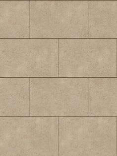 a beige brick wall textured with small squares