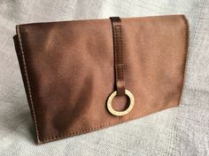 The small clutch from Bulgari has been used very little and therefore only has small signs of wear. It is also lined with a brown satin fabric, has a hand mirror and an inner zip pocket. Magnetic closure. Dimensions follow Free shipping worldwide including tracking number! Bulgari Clutch, Vintage Bulgari, Brown Satin, Small Clutch, Hand Mirror, Small Signs, Clutch Handbag, Magnetic Closure, Satin Fabric