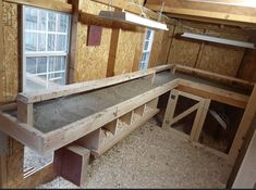 the inside of a chicken coop is being built